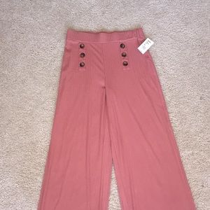 High waisted pants/ tight around waist